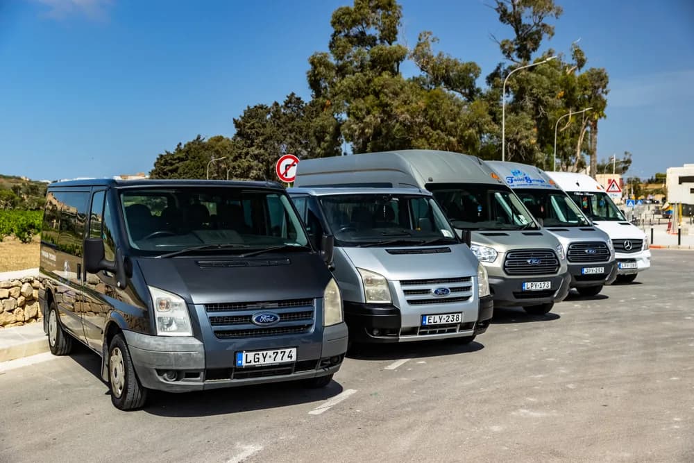 The Faith Garage fleet of cabs and minicoaches lined up